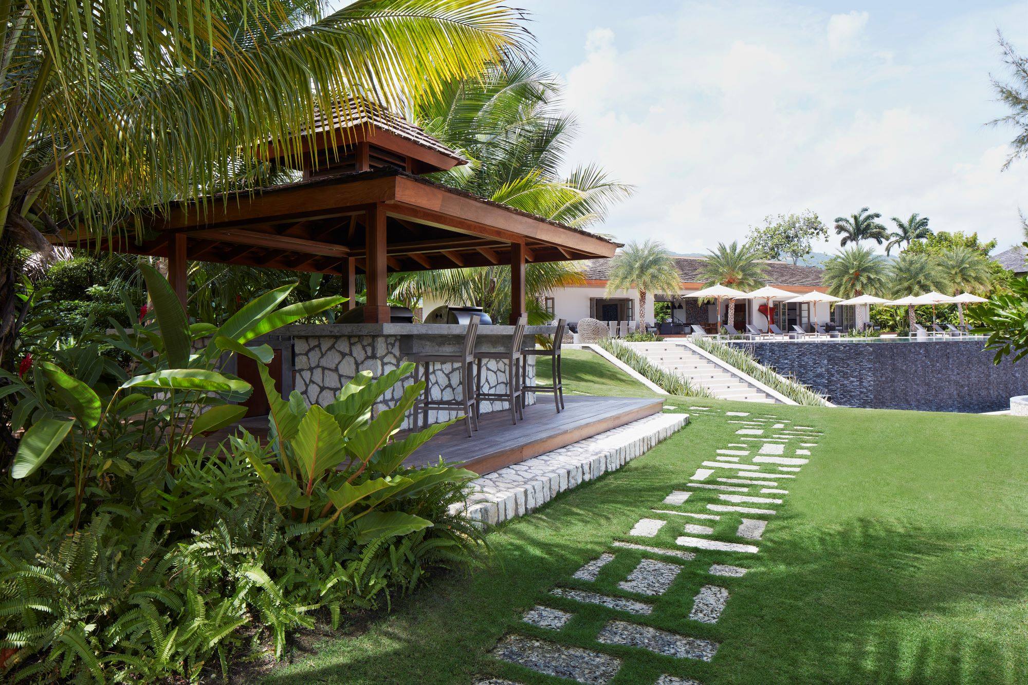 gazebo, pavilion, grass pavers, grass, bar, tropical, Caribbean style, outdoor entertainment, plants, palm trees, trees, poolhouse, pool, infinity pool